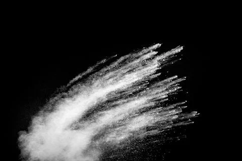 White powder explosion clouds.Freeze motion of white dust particles splash .. Stock Photos