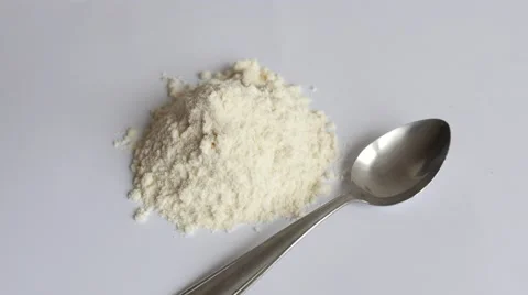 White powder rotating on white Video stock 47792503