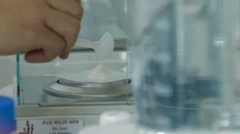White Powder on a Scale And Lab Mixer Stock Footage 61458326