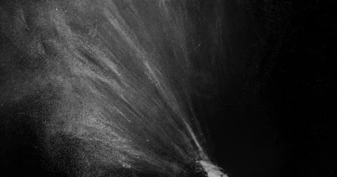 White powder thrown on black background Stock Footage 253161125