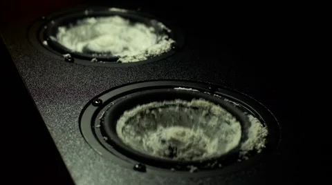 White powder vibrates on dynamics of a loudspeaker Stock Footage 61672266