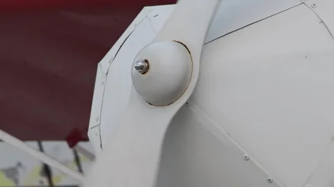 White propeller spinning on red airplane Stock-Footage 307865611