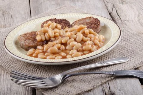 White pudding and baked beans Stock Photos