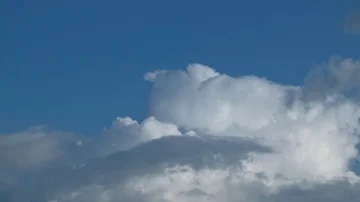White puffy clouds on the blue sky background. Stock Footage 86113671