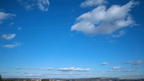 White puffy clouds on the blue sky background. Stock Footage 86113890