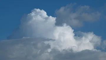 White puffy clouds on the blue sky background. Stock Footage 86114003