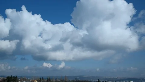 White puffy clouds on the blue sky background. Stock Footage 86114270
