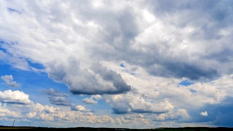 White puffy clouds on the blue sky background. Stock Footage 90843347