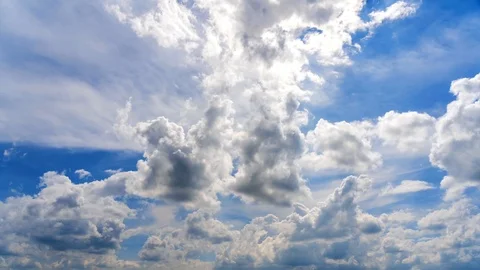 White puffy clouds on the blue sky background. 스톡 동영상 90843402