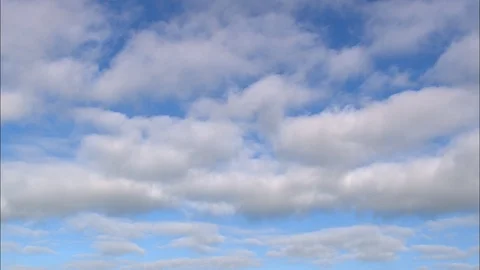 White puffy clouds on blue sky, Sky And Clouds Vidéo 109141346