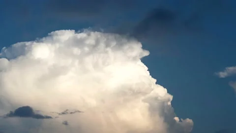 White puffy clouds on the blue sky background. Vídeo Stock 169230913