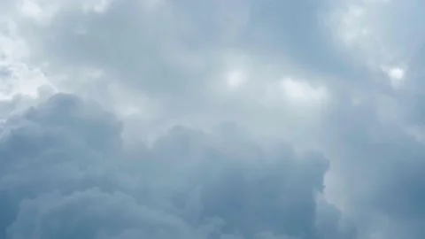 White puffy clouds on the blue sky background. Stock Footage 169231627