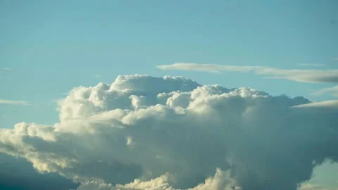 White puffy clouds on the blue sky background. Stock Footage 169232007