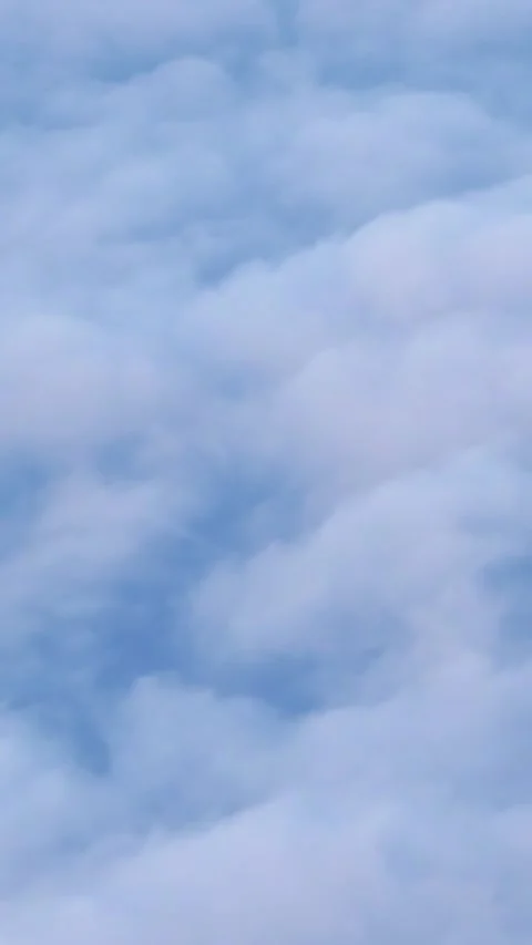 White puffy clouds moving through the atmosphere 스톡 동영상 344889562