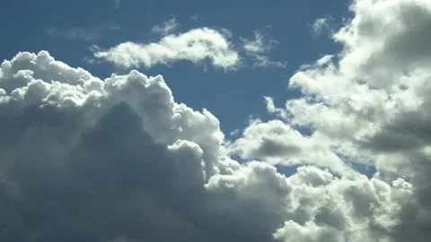 White Puffy Spring Cumulus Rain Clouds Moving In The Sky Stock Footage 172599272
