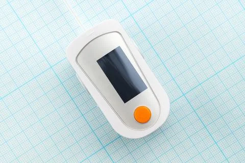 White pulse oximeter close up on graph paper background Foto stock