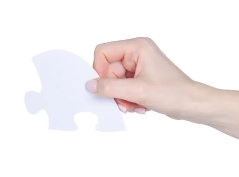 White puzzle in hand Stock Photos