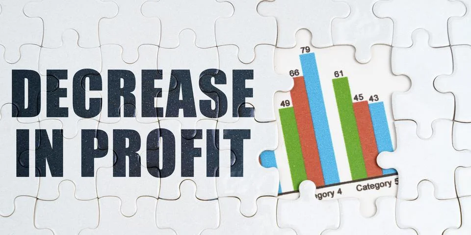 On white puzzles there is an inscription - Decrease in profit. Financial grap Stock Photos