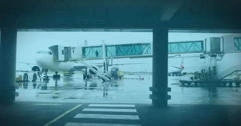 White QR code over fast motion people walking on the airport Foto stock