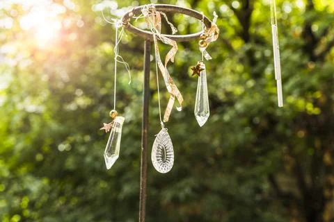 White quartz crystals hanging on strings. Nature background Stock Photos