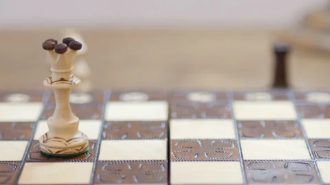 White queen counter attacking by taking black bishop. Chess business concept, Stock Footage 146228929