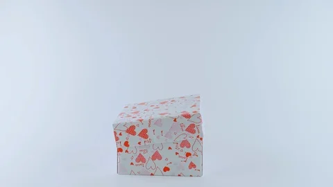 White rabbit gets out of the gift box, shakes, stands up on two legs Stock Footage 103508362