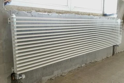 White radiators of heating system. New building house, heating i Stock Photos