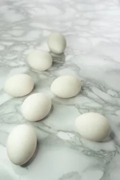 White raw eggs without packaging, whole and neat Stock Photos