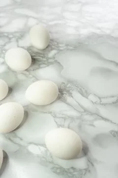 White raw eggs without packaging, whole and neat Stock Photos