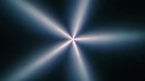 White rays emerge from the central point and move on a black background Stock Footage 313154305