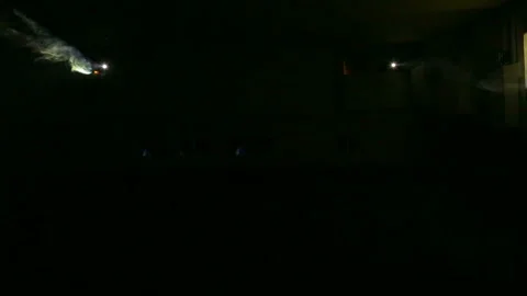 White rays of light profile spotlights in a smoke blanket. Stock Footage 116267739