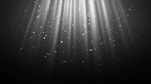 White Rays Shining on Black Background with Flying Backlit Dust Particles Looped Video stock 288835628