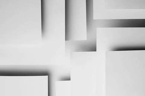 White rectangles paper surfaces fly with shadows, glow, stripes as complex ab Foto stock