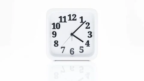 White rectangular alarm clock in white room. Designed in minimal concept. Stock Footage 256126863