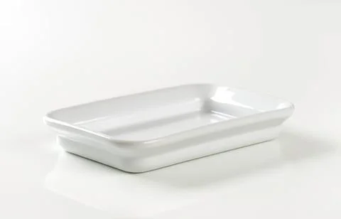 White rectangular baking dish on surface Stock Photos