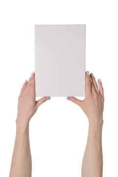 White rectangular box in female hands. Top view. Isolate Stock Photos
