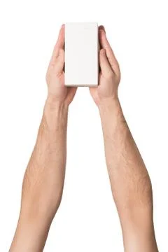 White rectangular box in male hands. Top view. Isolate 스톡 사진
