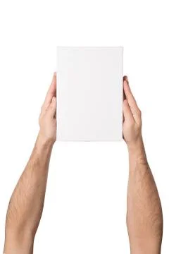White rectangular box in male hands. Top view. Isolate 스톡 사진