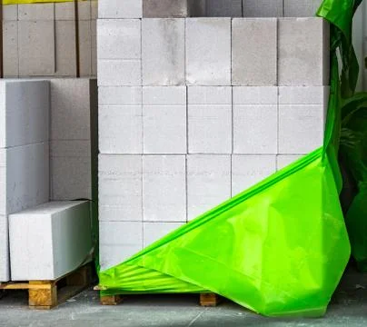 White rectangular bricks on an outdoor pallet. Stock Photos