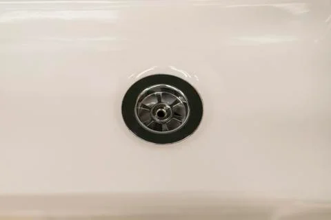 White rectangular ceramic sink with round hole Stock Photos