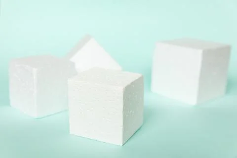 White rectangular cube shapes on blue background. Minimal boxes geometric for Stock Photos