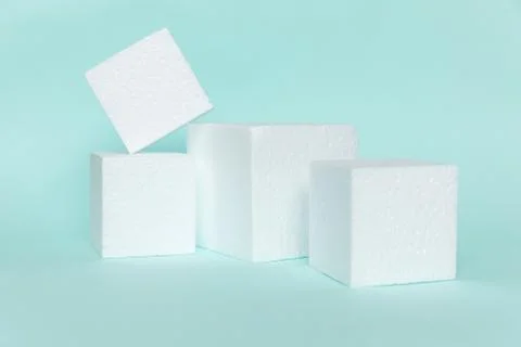 White rectangular cube shapes on blue background. Minimal boxes geometric for Stock Photos