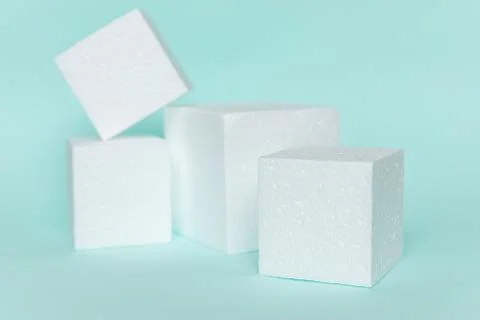 White rectangular cube shapes on blue background. Minimal boxes geometric for Stock Photos