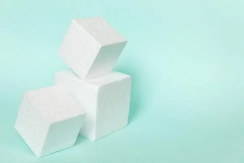 White rectangular cube shapes on blue background. Minimal boxes geometric for Stock Photos