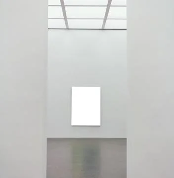 White rectangular surface attached to a wall of light gray 스톡 사진