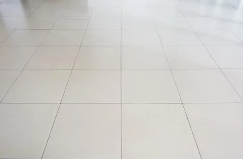 White rectangular tiles flooring pattern surface texture. Close-up of interio Stock Photos