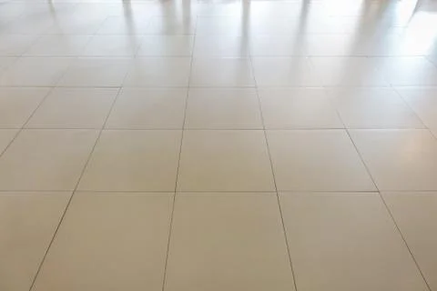 White rectangular tiles flooring pattern surface texture. Close-up of interio Stock Photos