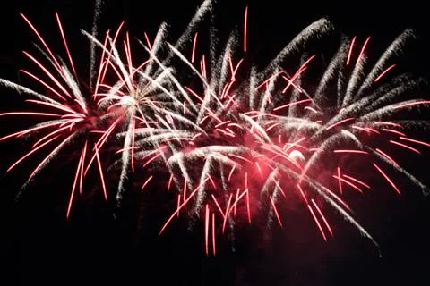 White red flashes rosette fireworks fireworks on a dark background holiday Stock Photos