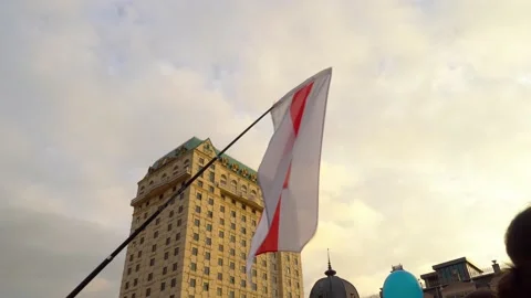 The white-red-white flag is waving in the wind against the sky. Stock Footage 171130324