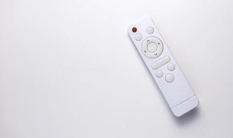 White remote control on a white background. Layout with copy space. Stock Photos